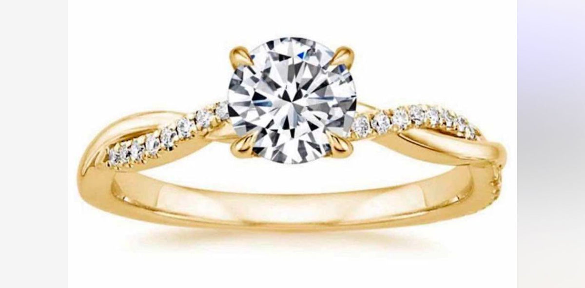 Anillo de Compromiso #100 – Diseño Entrelazado con Piedra Central